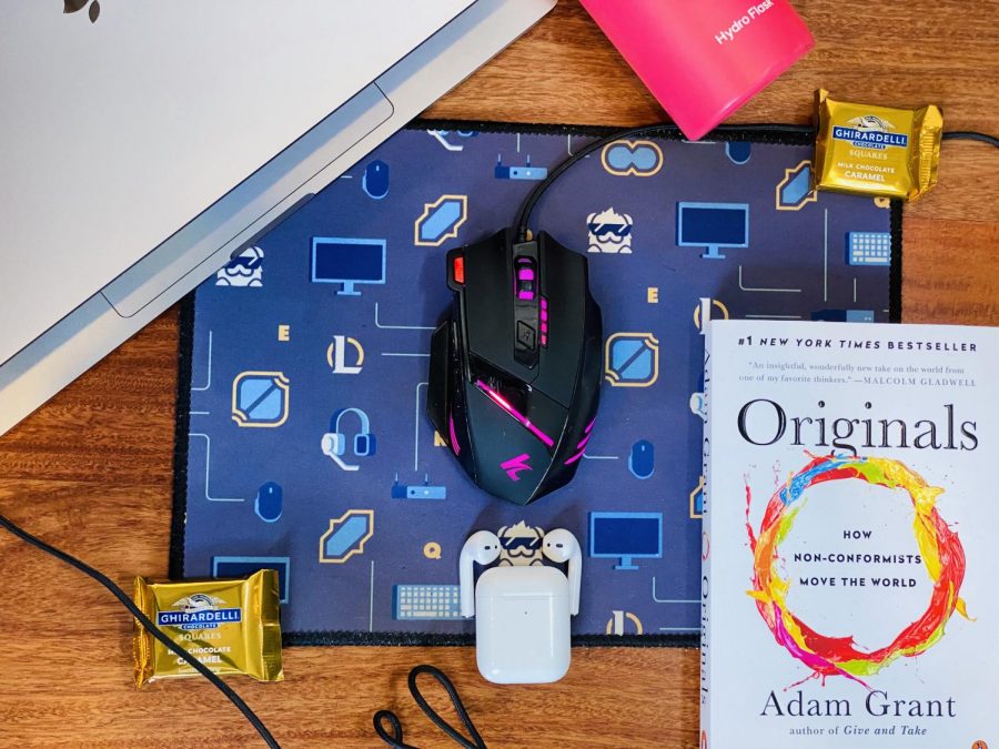 My pandemic survival kit consists of a mouse (and its cute mousepad), my laptop, a book of the week and chocolates and a water bottle for sustenance. Together, these items enable me to stay connected to reality and to my friends as the pandemic attempts to separate me from both.