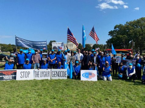 Clad in dark blue shirts, Uyghur protestors gather in Washington D.C. on Oct. 1 on the Global Day of Action. The Chinese government has detained between 1 million and 3 million Uyghurs, a Muslim Turkic minority native to the Xinjiang Uyghur Autonomous Region, also known as East Turkestan, in Northwest China, in over 380 internment camps since 2017.