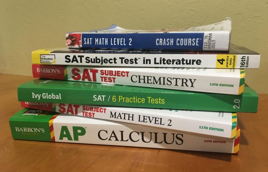 A stack of SAT-prep books. The College Board announced that administration of SAT Subject Tests and the optional SAT Essay would be eliminated on Tuesday. 