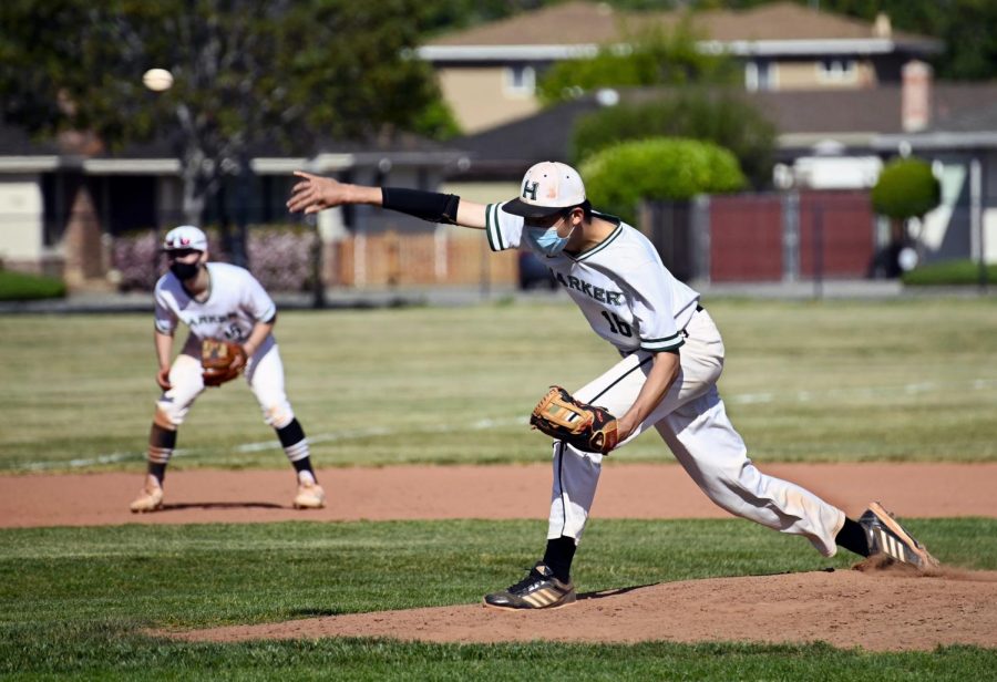 Mark Hu (11) pitches during the baseball team’s game against Crystal Springs. Mark pitched a perfect game against Priory on May 11, in which he struck out a record-setting 18 batters, making Harker and CCS history.