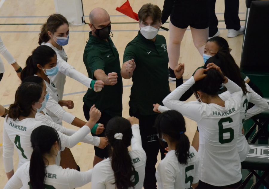 The junior varsity girls volleyball team huddles up between sets during the teams match against Notre-Dame Belmont today. The girls lost 16-25, 16-25.