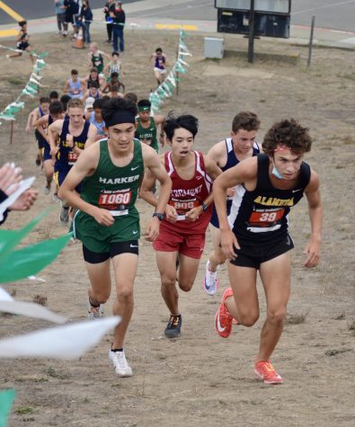 Junior Rigo Gonzales pushes up a hill during the Ram Invitationals varsity boys race at Westmoor High school. The varsity boys raced at 3:30 p.m., following the JV boys at 1:30 p.m. and the varsity girls at 2:30 p.m.