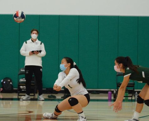 Gwen Yang (11) prepares to receive a serve. The junior varsity girls volleyball team will face Notre Dame this Tuesday at 5:00 p.m. for the last match of their season.