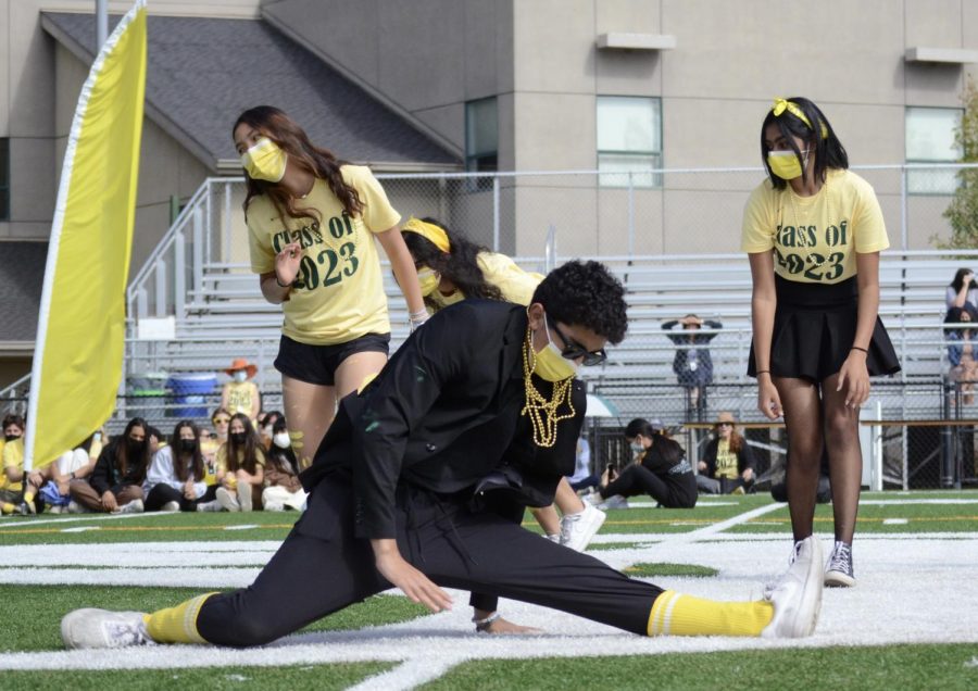 BB Ajlouny (11) drops into a split during the junior lip sync. BB played a member of Migos since the rap group's song was used in the junior lip sync.