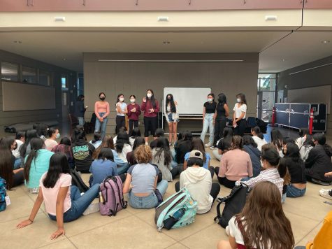 WiSTEM officers Kavita Murthy (12), Claire Luo (10), Ella Yee (10), Emily Zhou (12), Amiya Chokhawala (11), Catherine He (12), Thresia Vazhaeparambil (12) and Eileen Ma (11) hold a club meeting in the Nichols Atrium on Sept. 20. The club aims to encourage more female students to participate in STEM fields.