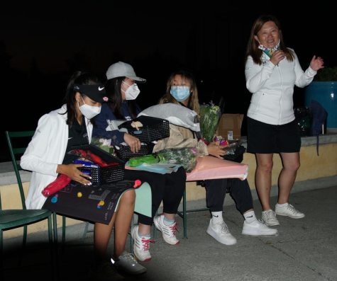 Seniors Andrea Thia, Esther Wu and Tina Xu hold gifts, posters and flowers during the Senior Night ceremony. The varsity girls golf teams Senior Night was held on Nov. 12 at the Los Lagos Golf Course in San Jose.