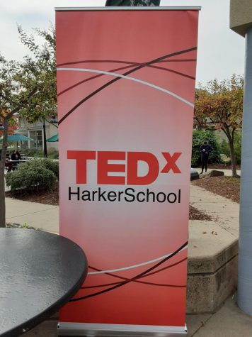 A TEDx banner sits outside Manzanita during lunch today. TEDxHarkerSchool will host its annual speaker event, themed “Transcending Boundaries,” in the Rothschild Performing Arts Center at the upper school tomorrow in a return to an in-person format after last year’s weeklong virtual event. 
