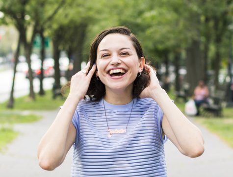 New York-stationed journalist Isabelia Herrera smiles, tucking her hair behind her ears. Herrera writes about music and Latinx culture as an Arts Critic Fellow at The New York Times. 
