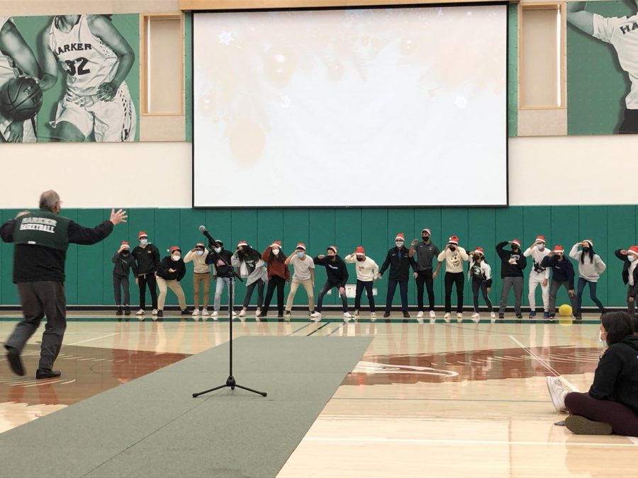 Upper School Division Head Butch Keller joins in on student councils dance skit, performed to to Lil Nas X’s “HOLIDAY. Last Thursdays school meeting marked the last school meeting of 2021.