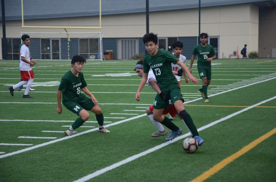 Alec Zhang (9) dribbles the ball past a North Salinas defender. The varsity boys soccer team tied North Salinas 2-2 on Friday in their third game of the season.