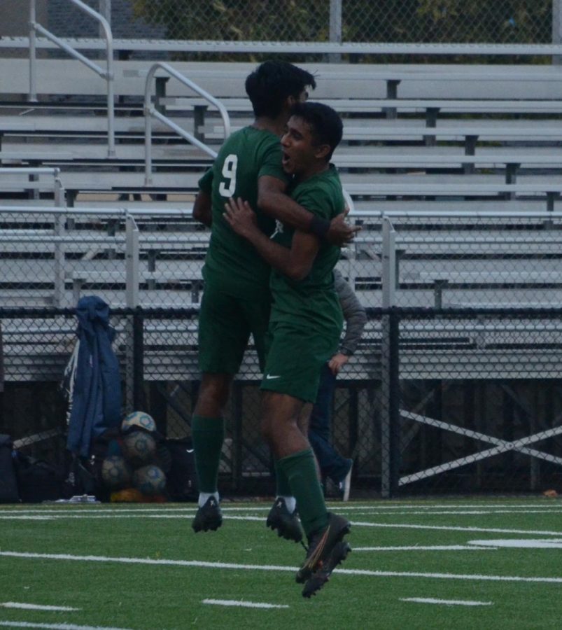 Seniors Ishaan Mantripragada and Muthu Panchanatham embrace after Ishaan scored Harkers second goal, tying the score at 2-2.