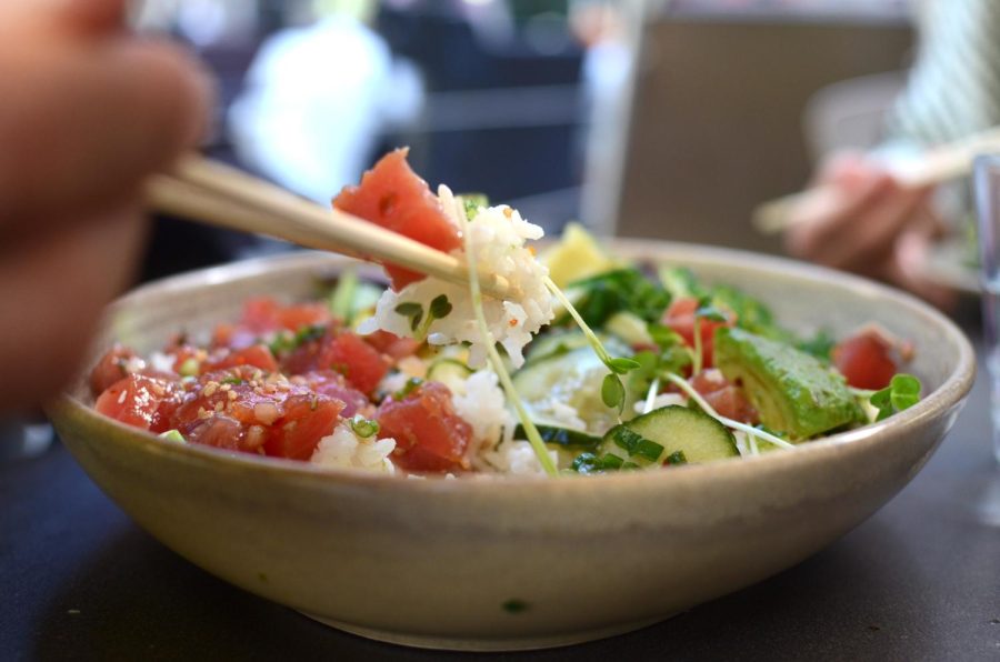 Pacific Catch's Japanese Wasabi Original Ahi Poke ($16 for small, $19 for regular), which includes a wakame seaweed salad, sushi rice and Ahi poke, sits on a table. The restaurant's Cupertino Main Street location operates from 11 a.m. to 9 p.m.