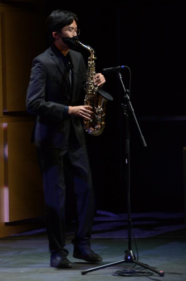 Jazz Band member Aaron Tran (12) performs a solo on the saxophone during the instrumental concert. Camilla Lindh (12) also took on a saxophone solo, and Kai Burich (12) played lead trumpet for the group.