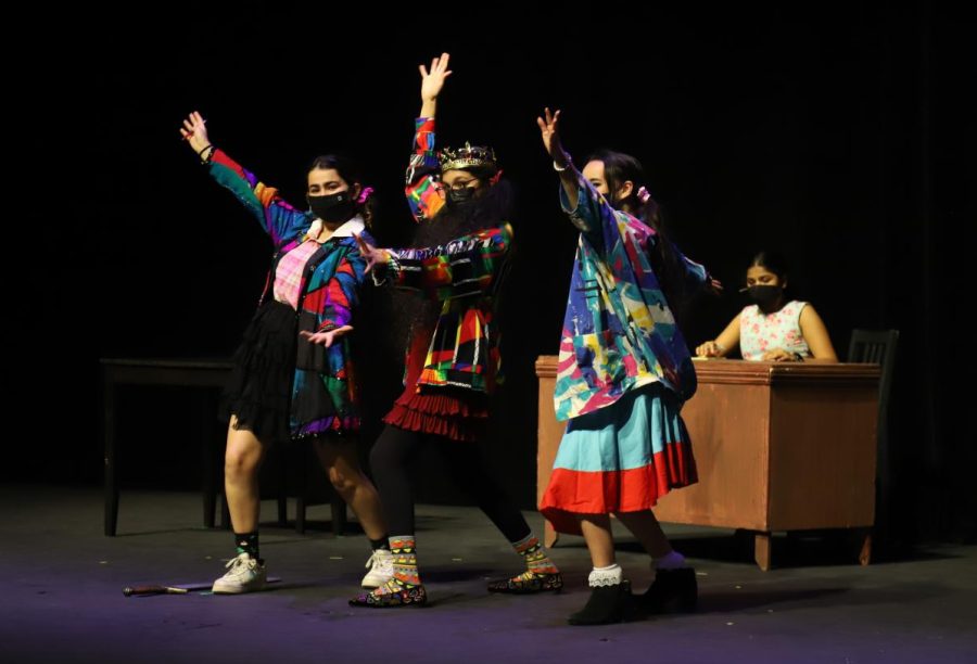 Students in Governing Alice played by Sidak Sanghari (9), Leyla Artun (12) and Arianna Weaver (12) wave their hands. Four student-directed plays performed in the Rothschild Performing Arts Center on Jan. 7 and Jan. 8.