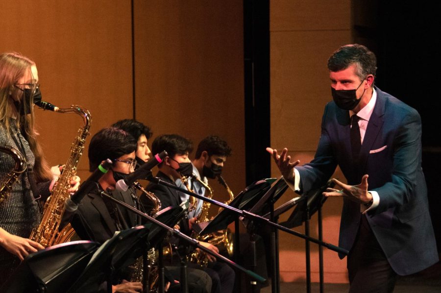 Upper school director of instrumental music Dr. David Hart conducts Jazz Band at the instrumental concert on Jan. 14. The winter vocal concert took place on Jan. 13, both in the Patil Theater of the Rothschild Performing Arts Center. 
