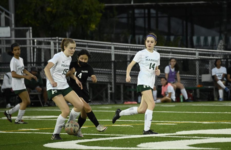 Ashley Barth (12) dribbles the ball past an Eastside College Prep defender.