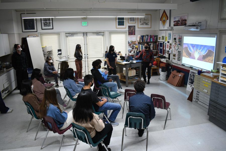 Art Club town hall attendees listen to the presentation of potential ideas and designs for the Quad mural. The Art Club plans to open voting of the final design for students and faculty on Feb. 28 through March 4.