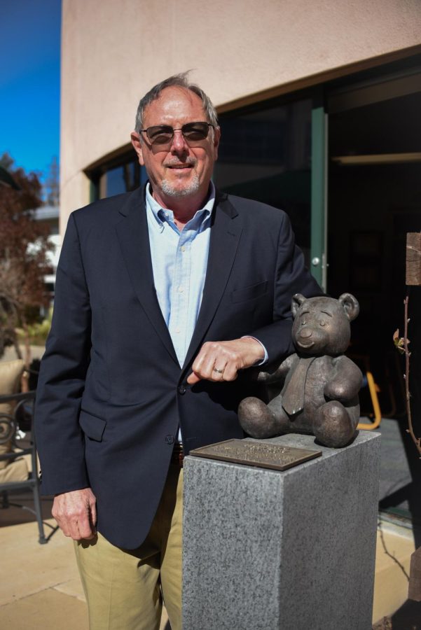 Head of Upper School Butch Keller poses next to the bear statue outside Dobbins honoring his son-in-law and beloved Harker teacher, Jason “Bear” Berry, who died in 2013. After 15 years at Harker as Head of Upper School and varsity boys basketball coach, Samuel “Butch” Keller Jr. announced his retirement in early fall — he and his wife, Jane Keller, who taught math and physics at the upper school, will be moving to South Carolina to be closer to family.