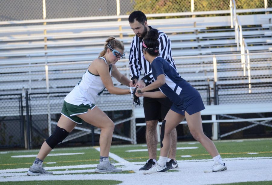 Kyra Hawk (11) prepares for a faceoff in the first half of the game. The Eagles lost 7-8 in their first match of the season against Notre Dame.