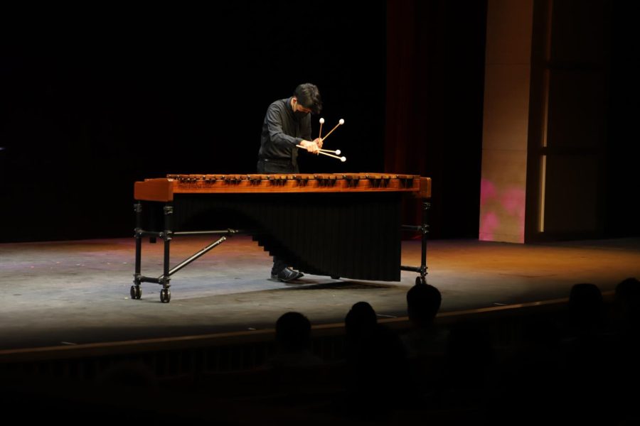 Harrison Chang (12) plays the marimba with two wooden bars in each hand at the Chamber Music Concert on Feb. 25. A total of 13 students performed in small instrumental ensembles in the Patil Theater to live and virtual audiences.