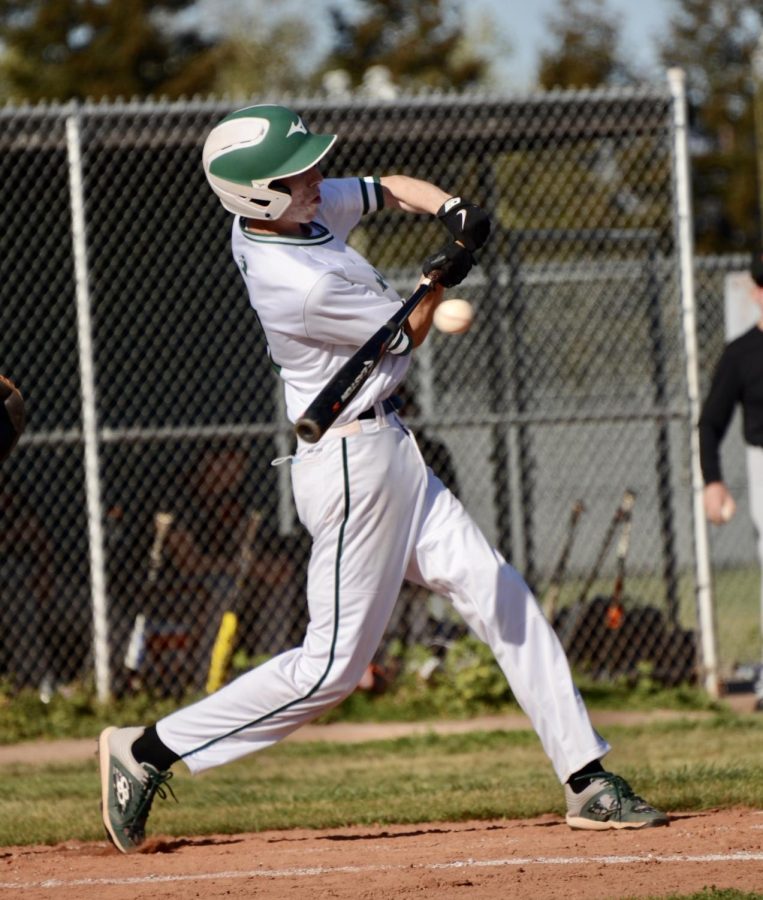 Jack Ledford (10) swings in the second inning. Following this hit, Jack advanced to first base.