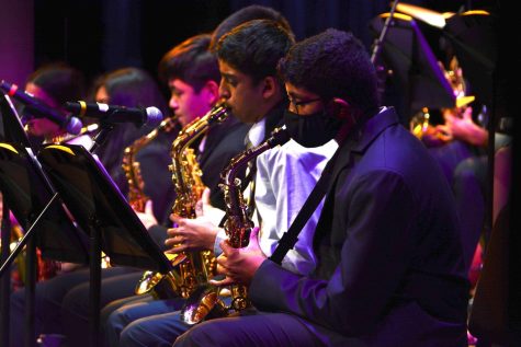 Shiven Balaji (9) plays the saxophone with Lab Band during the Evening of Jazz performances on April 14. The Grade 7-8 Jazz Band and Upper School Jazz Band also participated in the concert, with the groups playing a combined total of 15 pieces. 