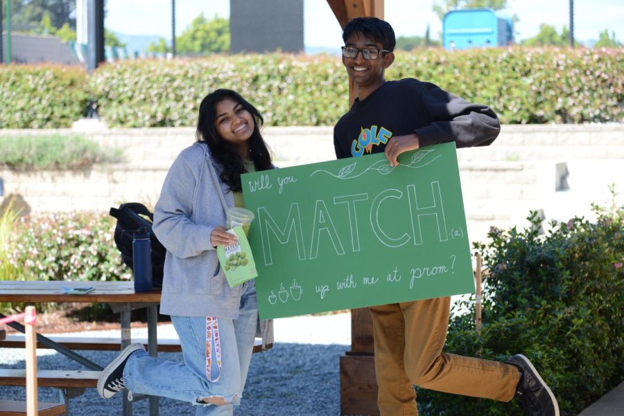 Arvin Nidadavolu (12) smiles with Syna Gogte (12) after a successful matcha-themed promposal. 

I just heard from her friends that she liked matcha tea from Starbucks, so I thought I could just carry over like a whole theme, Arvin said. It was fun to plan the poster.