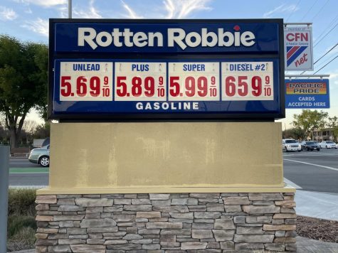 A Rotten Robbie gas station sign displays the increased prices for gas in San Jose, California, on March 25. Californias current average gas price is $5.689 and had a price peak on March 29 at $5.919.