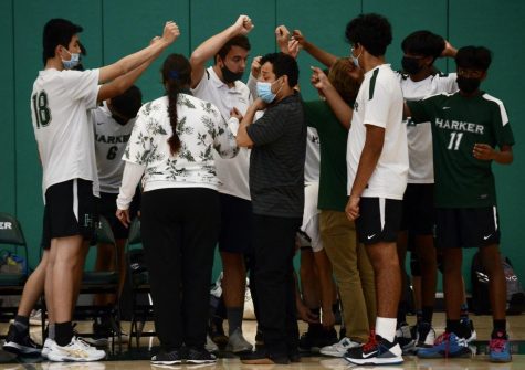 The junior varsity boys volleyball team put their fists in the air for a cheer before the start of their match against Cupertino High School. In their practices leading up to the game, the team focused on communication and blocking.