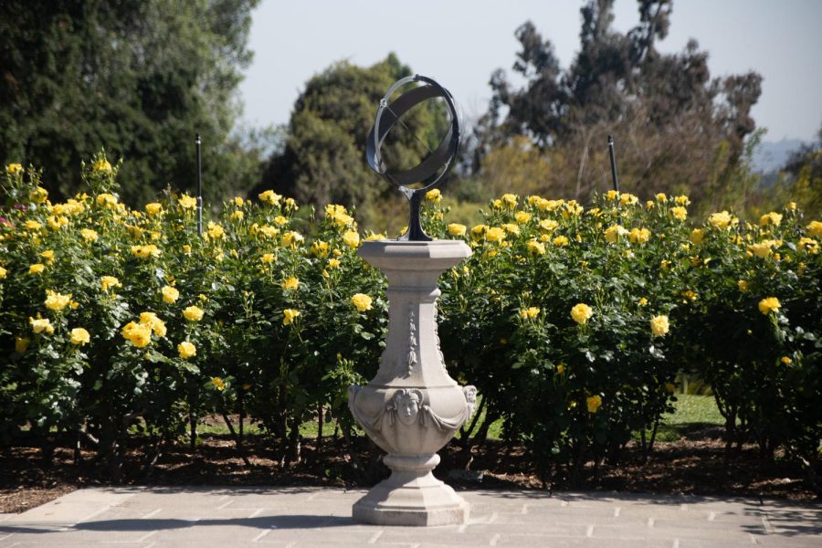 A metal ring statue stands in the Rose Garden at the Huntington. The garden was initially created in 1908 for the private use of Henry and Arabella Huntington and later opened to the public in 1928.