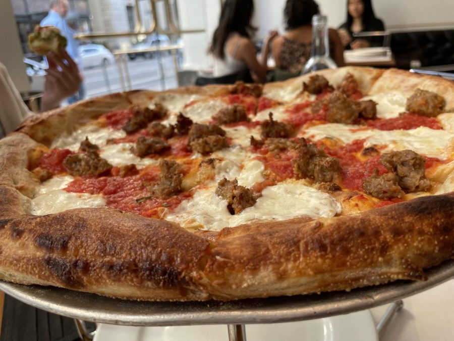 The sausage pizza at Bottega Louie. The restaurant serves seven types of pizza starting at $30.