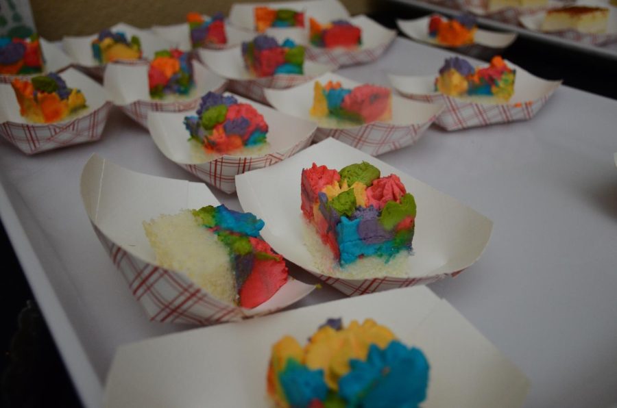 Rainbow-colored cakes sit in Manzanita Hall during lunch on Wednesday. Harker chefs also made checkerboard cookies with a variety of colors to celebrate Wednesdays spirit theme of LGBTQ+ pride, a collaboration between Harker Spirit Leadership Team (HSLT) and the Gender and Sexuality Alliance (GSA).