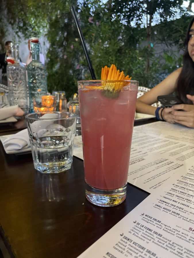 A flower floats in the pink Rose Bud mocktail, which has hints of lemon and pomegranate. Customers could also order other mocktails or sweet milkshakes for beverages. 