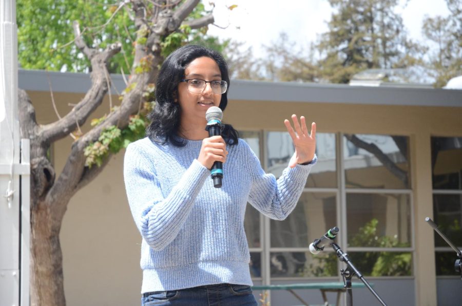 Ritu Belani (10) performs a stand-up comedy act at Quadchella: Spring into Climate Action in the Quad on April 22. Ritus act covered promposals and AP exams.