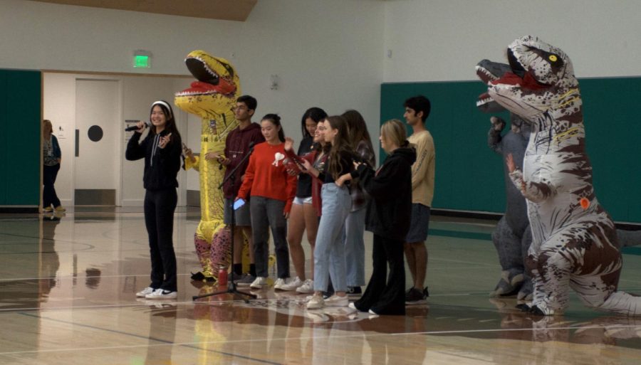 Harker+Spirit+Leadership+Team+officers%2C+some+donning+dinosaur+costumes%2C+discuss+Homecoming+week+activities+at+yesterdays+school+meeting.+Other+topics+included+Student+Directed+Showcase+announcements%2C+CareerConnect+opportunities+and+Honor+Week+activities.+