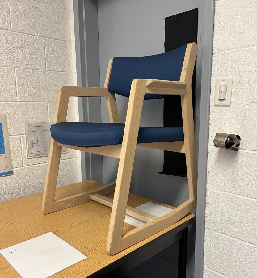 A chair leans against the door of upper school English teacher Susanne Salhabs room to act as a barricade during todays campus lockdown. After the lockdown from approximately 5 p.m. to 6:10 p.m., police have cleared the campus of a potential threat. 