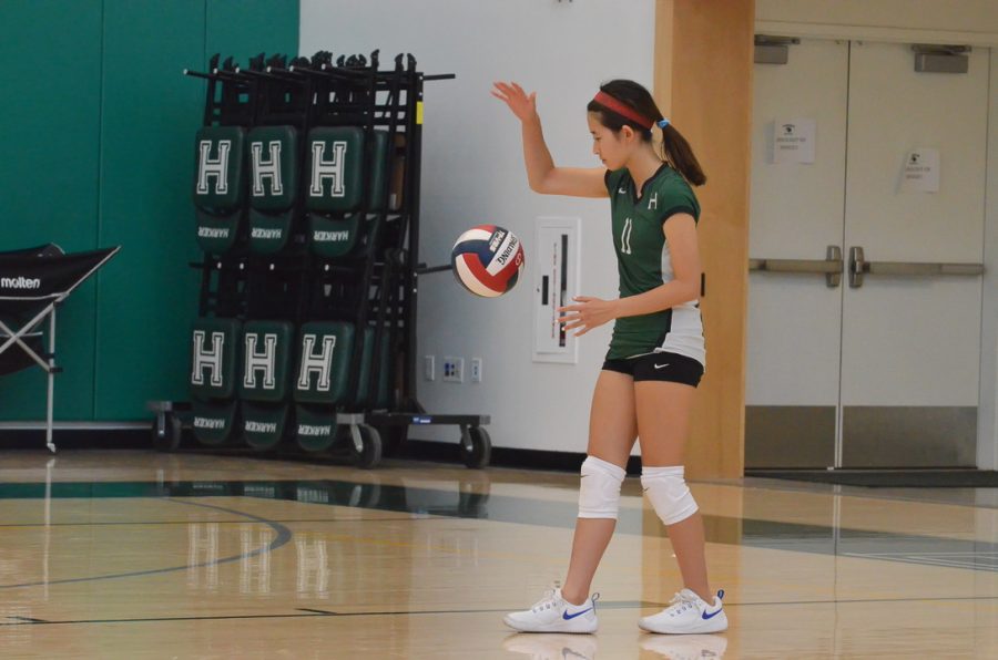 Yena+Yu+%289%29+bounces+the+volleyball+as+she+prepares+to+serve+the+ball.+The+frosh+and+sophomore+girls+volleyball+team+fell+to+Milpitas+High+School+on+Wednesday+after+losing+their+first+set+19-25%2C+winning+their+second+set+25-19+and+losing+their+third+set+9-15.