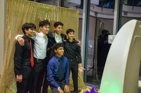 Seniors Pranav Mullappalli, Rigo Gonzales, Zain Vakath, BB Ajlouny and Nikhil Devireddy pose for a picture at the photo booth in the Nichols Rotunda. The upper school hosted its annual Homecoming Dance in Nichols Hall on Oct. 14 from 7:30 p.m. to 10:30 p.m.