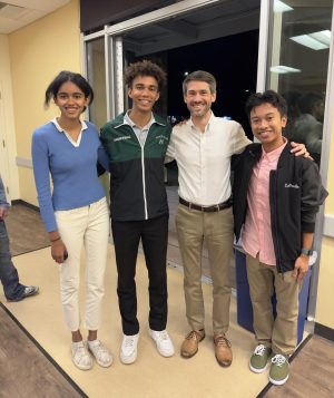 Harker seniors Sara Bhowmick, KJ Williams and Kris Estrada pose with San Jose mayoral candidate Matt Mahan. Harker and Yerba Buena High School students hosted a youth campaign forum for the mayors on Oct. 25. 