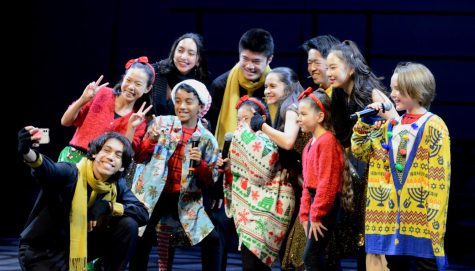 Performers gather on stage to close out the Big Assembly Day show. Upper school students watched Harker’s annual holiday concert Big Assembly Day (BAD) on Dec. 9, where ensembles from the lower, middle and upper schools performed various acts across all campuses. 