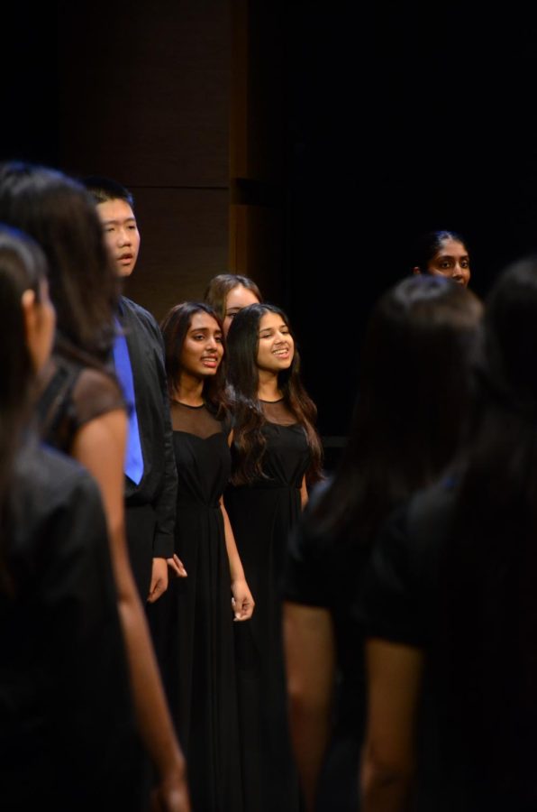 Members of Camerata, conducted by upper school vocal instructor Susan Nace, sing “Come Joy and Singing.” Afterwards, they sang an Indian song called Tarekita with Bel Canto. 