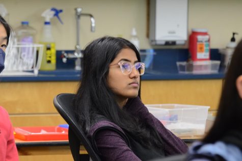 Attendee Kashish Priyam (10) listens to Dr. Jangs talk. “A lot of the time when we hear about research, it’s skewed to one perspective, so it’s nice to hear from [other viewpoints] to learn about what it would be like if we wanted to join any of these fields,” Kashish said. 