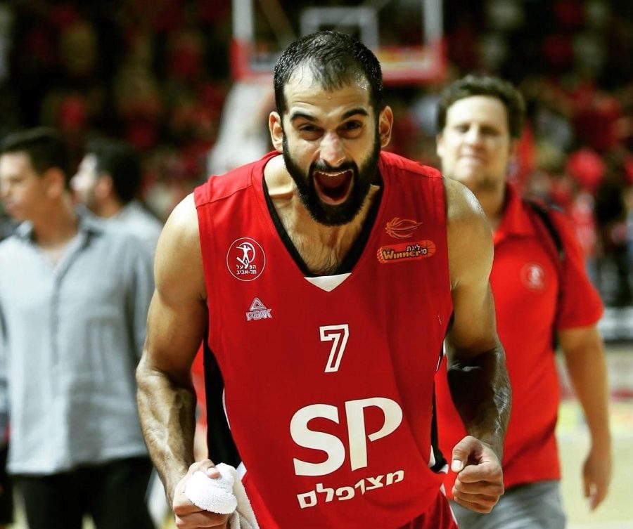 Robert Rothbart bursts into celebration after beating Hapoel Jerusalem in the Israeli Winner Cup while playing for Hapoel Tel Aviv. Rothbart graduated from the Harker middle school in 2000 and has played professional basketball for several European teams since.