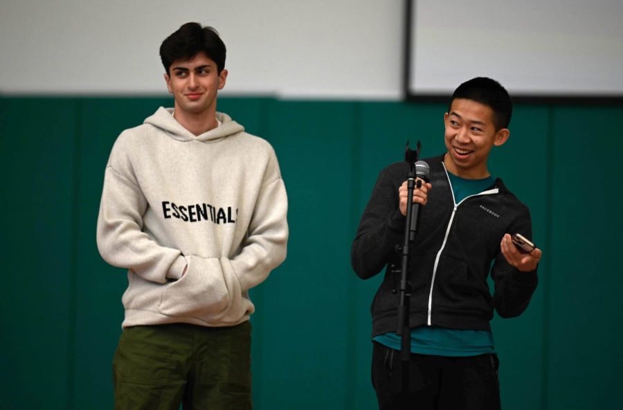 Harker Conservatory representatives Luke Mehta (11) and Richard Zhang (12) announce Downbeats holiday tour. The show group closed their tour with a performance in the Patil Theater at 8:30 pm on Friday. 