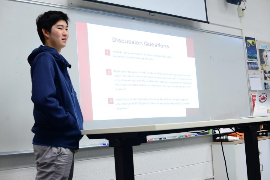 Public Health Club Vice President Justin Chen (11) leads attendees through a discussion question at the clubs meeting in Main 2 on Friday during long lunch. The meeting started with a presentation of background information before moving into a discussion period.