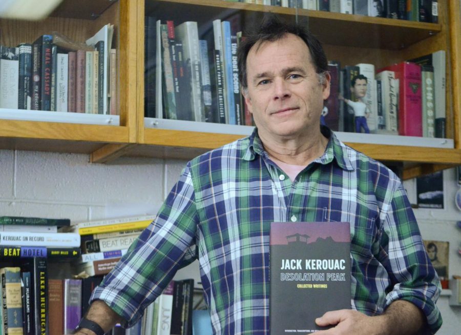 Upper+school+English+teacher+Charles+Shuttleworth+poses+with+his+recent+book+titled+%E2%80%9CDesolation+Peak%3A+Collected+Writings%2C+a+collection+of+Beat+Generation+poet+Jack+Kerouac%E2%80%99s+writings.+%E2%80%9CI+did+some+good+investigation%2C+and+it+was+really+fun%2C%E2%80%9D+Shuttleworth+said.+%E2%80%9CI+love+%5BKerouacs%5D+writing%2C+I+really+respect+it%2C+so+to+be+able+to+transcribe+it+just+for+myself+was+worth+it.+Overall%2C+I+felt+I+got+to+know+and+understand+him+better+than+I+ever+had.%E2%80%9D