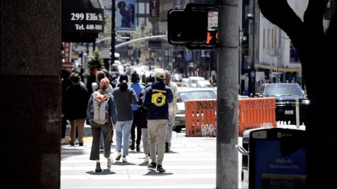 Tourists and locals walk along the sidewalks of the Tenderloin, taking in the warm afternoon weather and crowded streets. Harker journalism staff members attended the Spring JEA/NSPA Convention in the Tenderloin district from Thursday to Saturday.