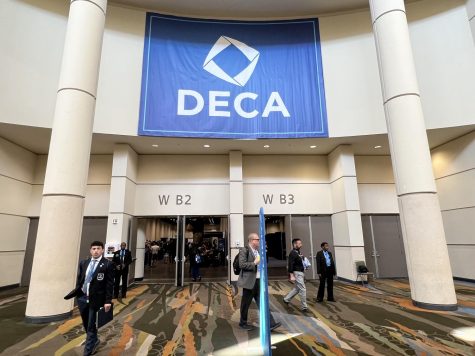 DECA International Career Development Conference (ICDC) competitors roam the convention center hallways and exhibit booths on April 23. During the conference, many schools and organizations set up booths to network with students from around the globe.