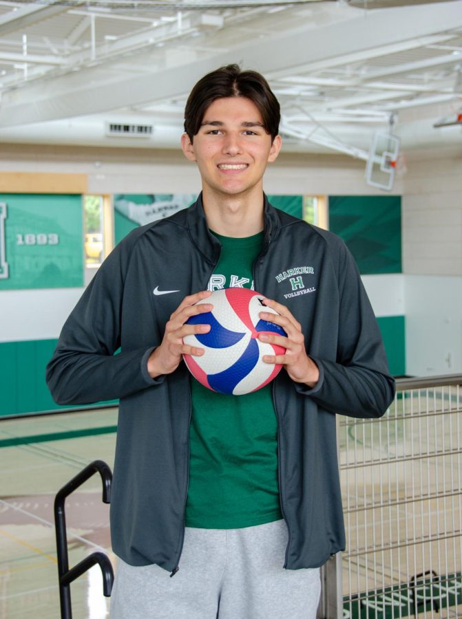 Edis Mesic (11) poses with a volleyball inside the Zhang Athletic Center. Edis has played volleyball for over six years, and has been involved in Harker’s volleyball program since his freshman year.