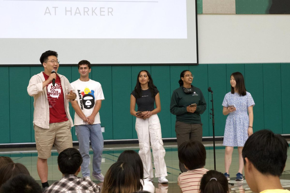 Conservatory members Jason Shim (11), Luke Mehta (12), Shareen Chahal (12), Sam Parupudi (11) and Iris Cai (11) announce the Conservatory Kickoff during the school meeting on Tuesday. I will be giving you your fresh, funky musical theater and theater news along with my colleague Shareen! Jason said.